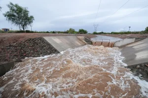 Arizona monsoon season flash flood in drainage canal